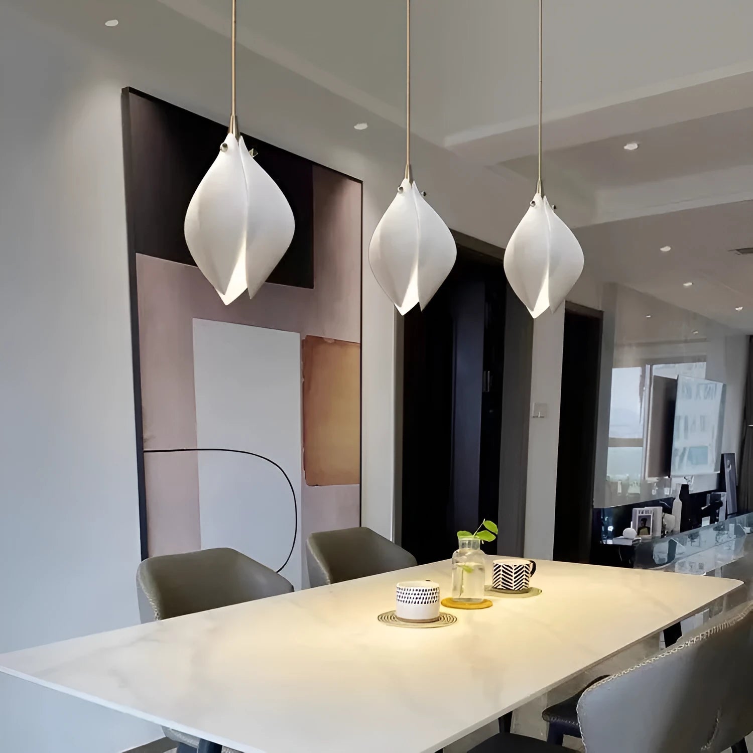 Ceramic magnolia coloured single-head pendant light with petal chandelier design.