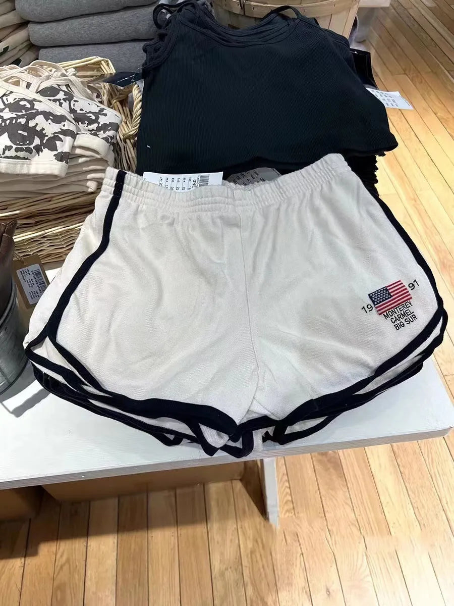 Women's dark blue cotton hot pants shorts with white flag embroidery, sporty athletic style