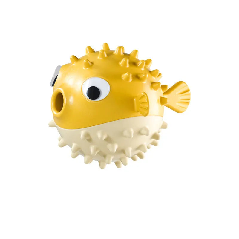 Green fish-shaped dog chew toy with raised surface particles for medium and large breed dogs