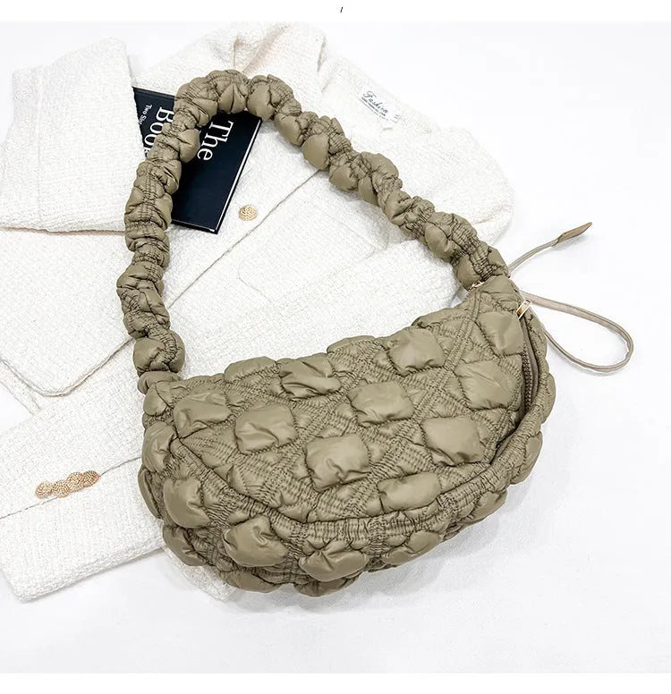 Women's nylon shoulder messenger bag in beige colour showing adjustable strap and dimensions