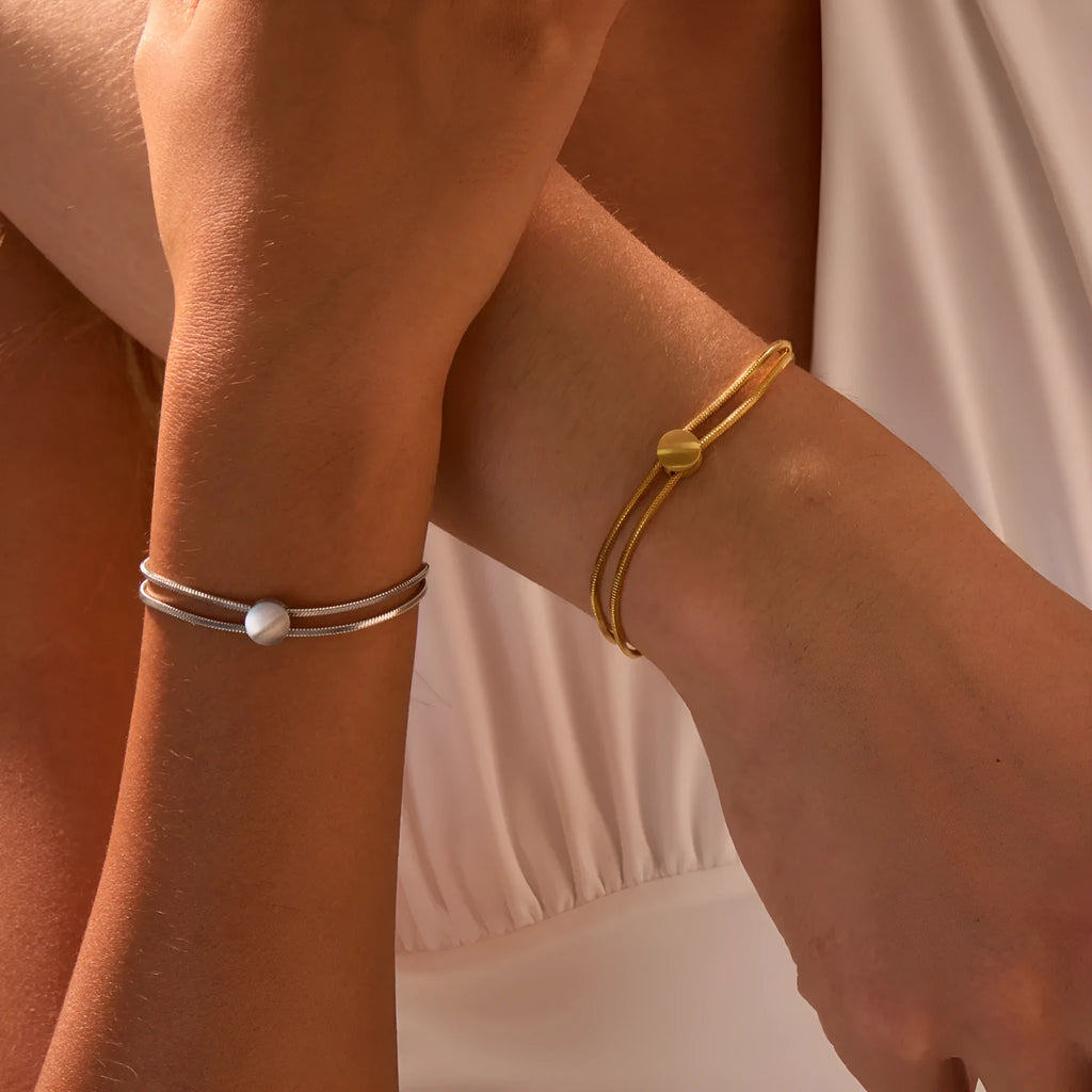 Women's 18K gold plated titanium steel snake chain bracelet on wrist