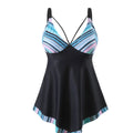 Plus size green two-piece bikini swimsuit with backless design on a mannequin.