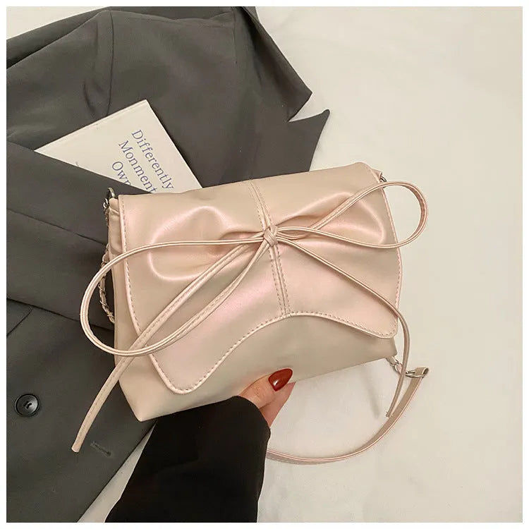 Women's large capacity horizontal square underarm bag in PU material with sewing line details and multiple colour options