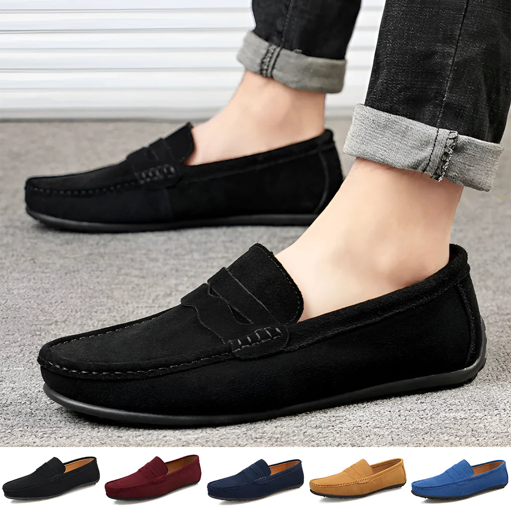 Men's solid colour suede leather slip-on loafers with a flat rubber sole.