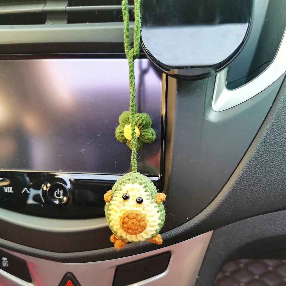 Handmade crocheted avocado car pendant with rainbow flower design in wool material