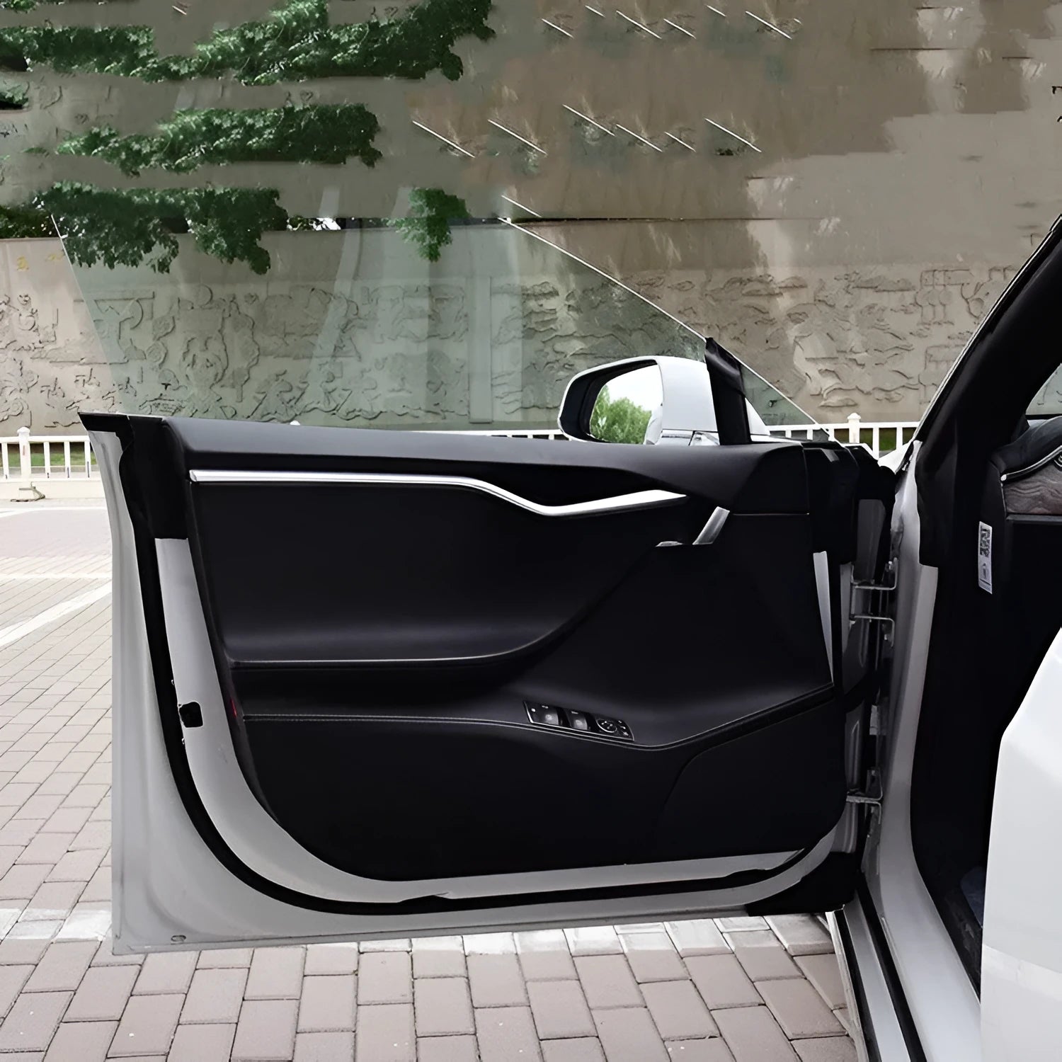 Carbon fibre protective film for Tesla Model S door interior control panels in 4-piece set