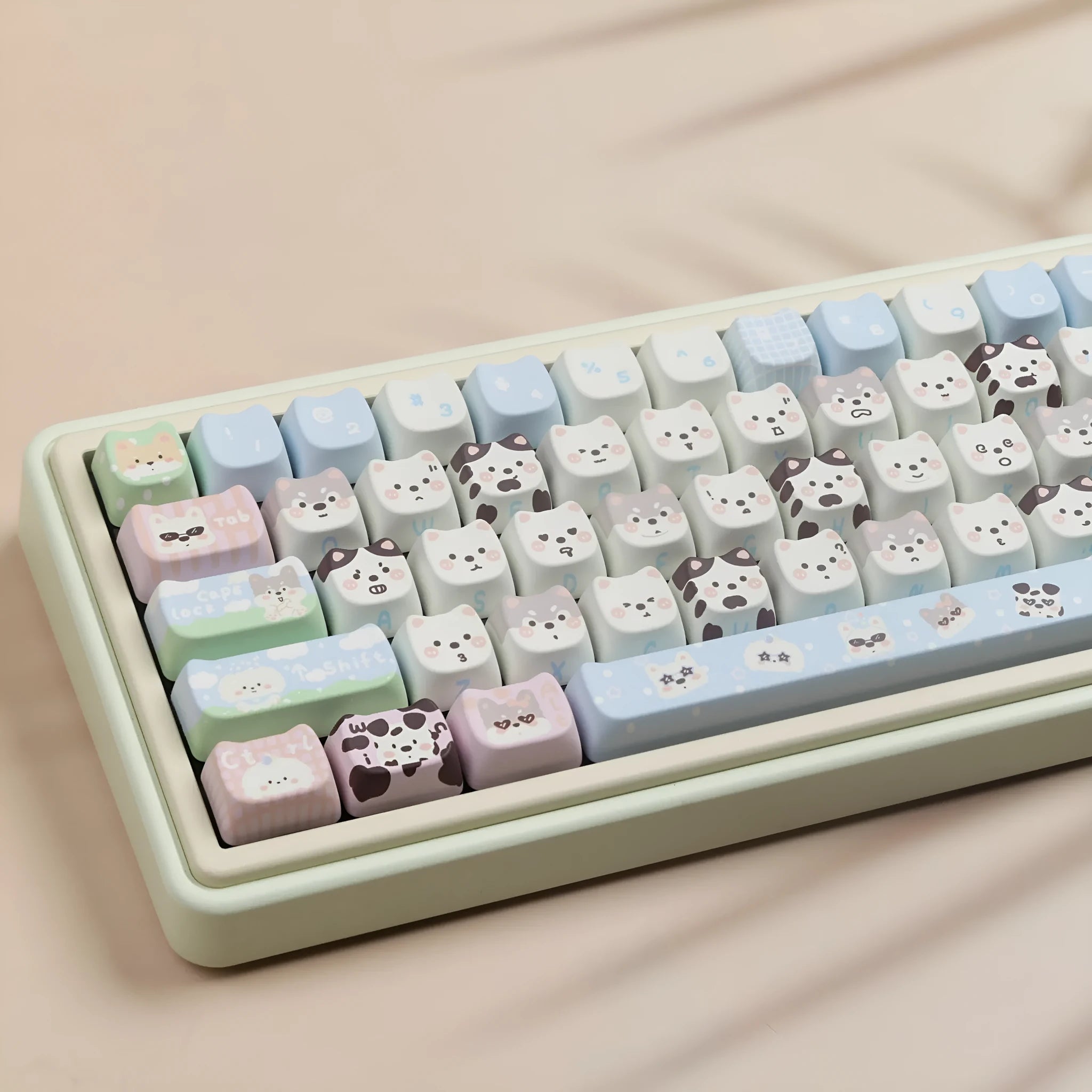 Colourful cat and puppy themed PBT key cap set for mechanical keyboards with cartoon animal artwork