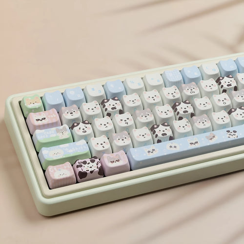 Colourful cat and puppy themed PBT key cap set for mechanical keyboards with cartoon animal artwork