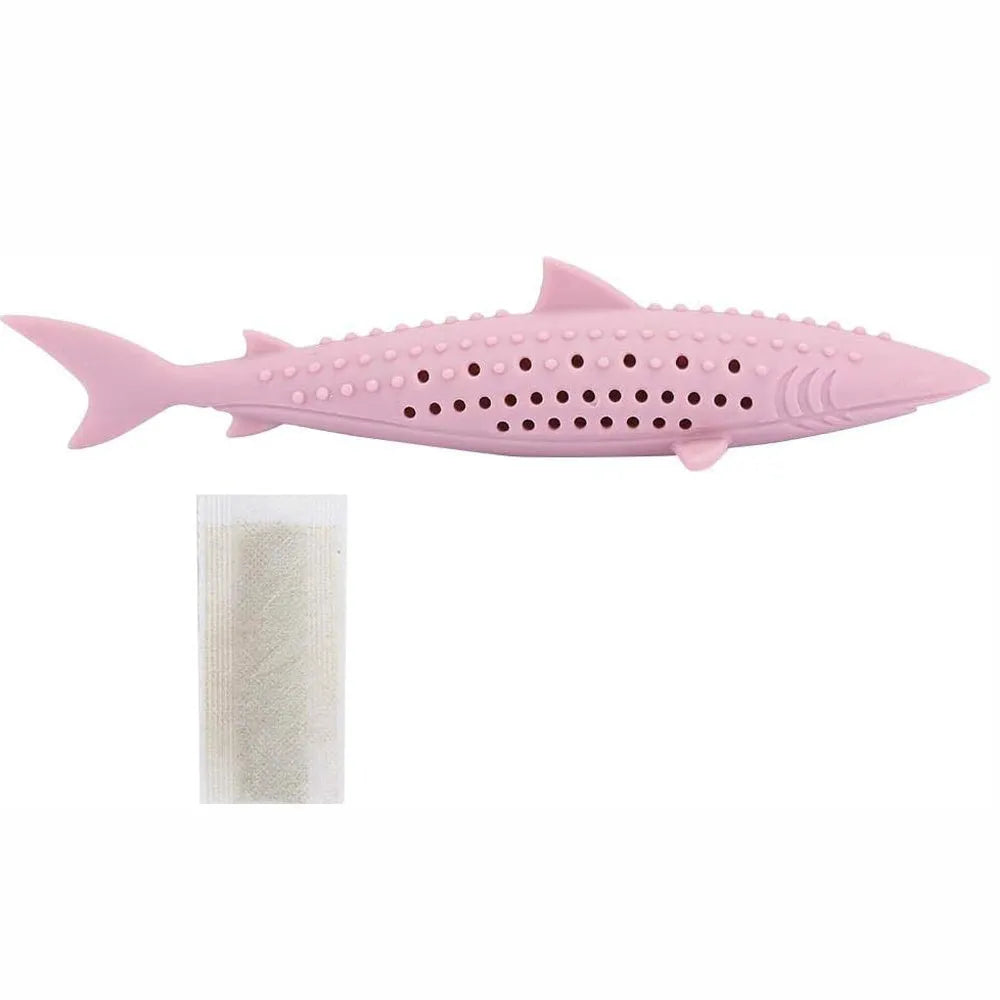 Green silicone fish shaped cat chew toy with breathable side holes on a white background