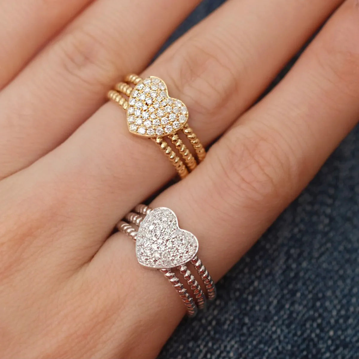 S925 sterling silver ring with heart twist design, available in white gold or yellow gold finish, US sizes 6 to 10