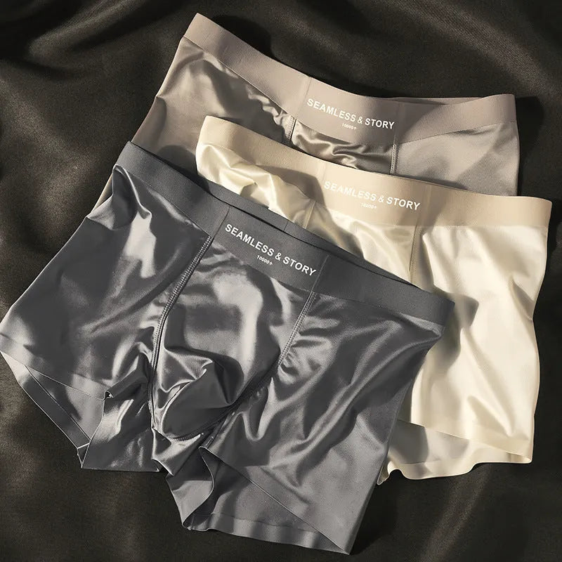 Men's ice silk underwear in satin finish showing mid-waist traceless design in coffee colour