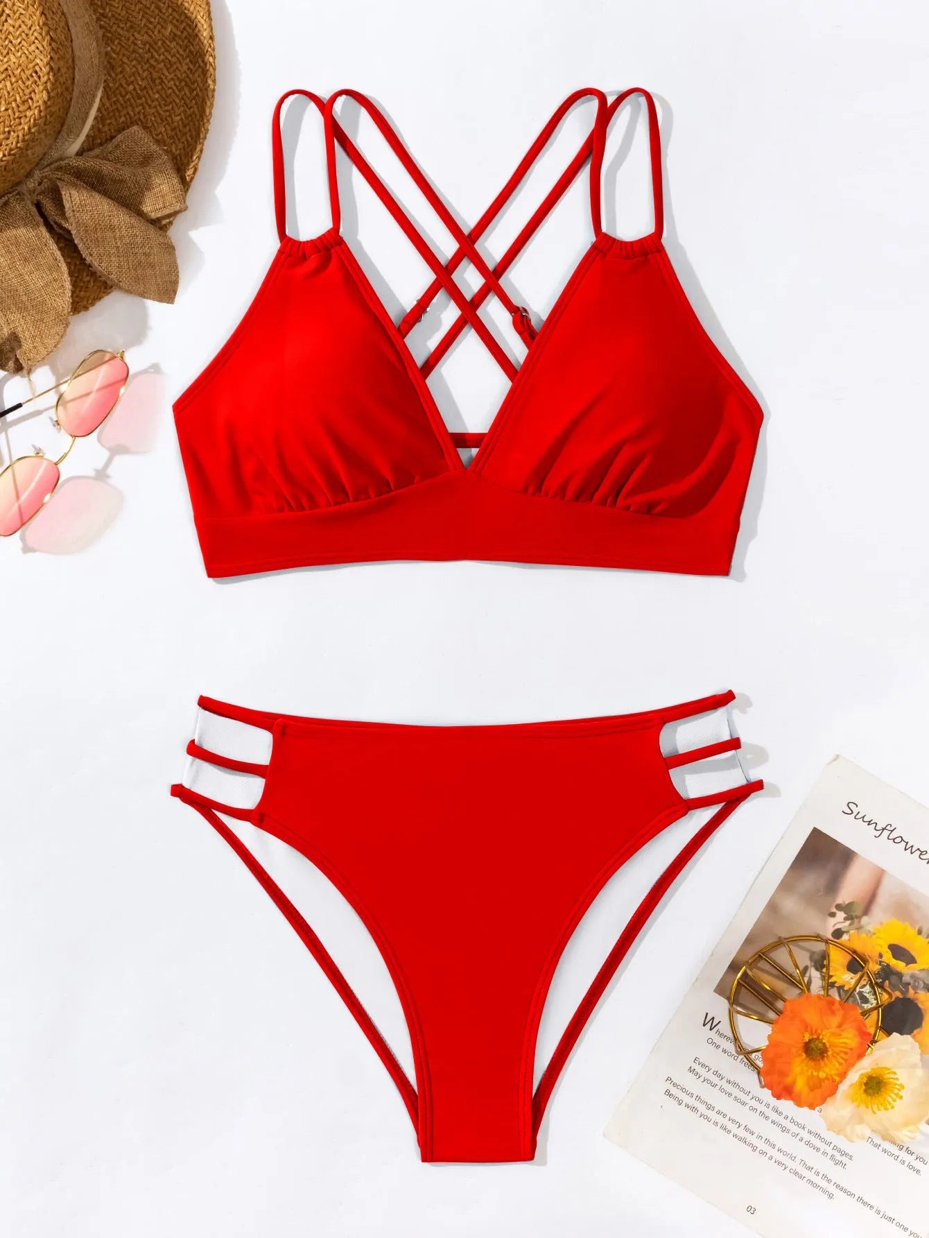 Women's black V-neck halter bikini with split-style shorts on a mannequin.