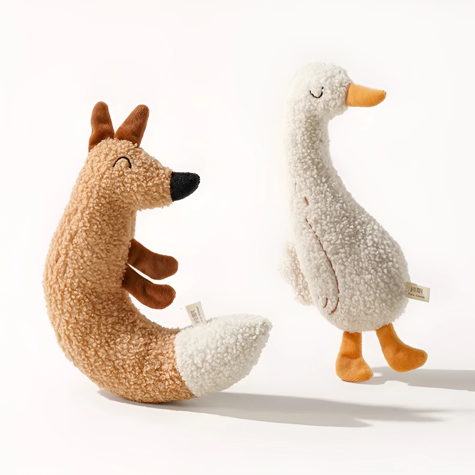 Cartoon fox and duckling dog chew toys in teddy velvet with crinkle sound elements