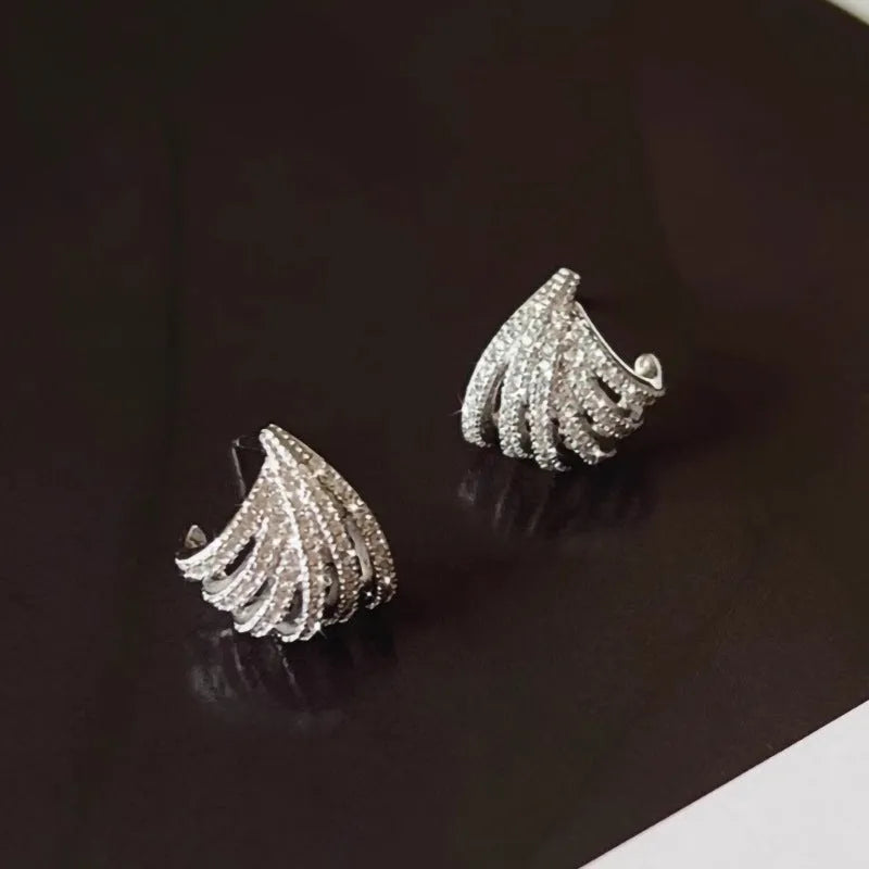 Women's geometric line design earrings with platinum electroplated finish on zircon material
