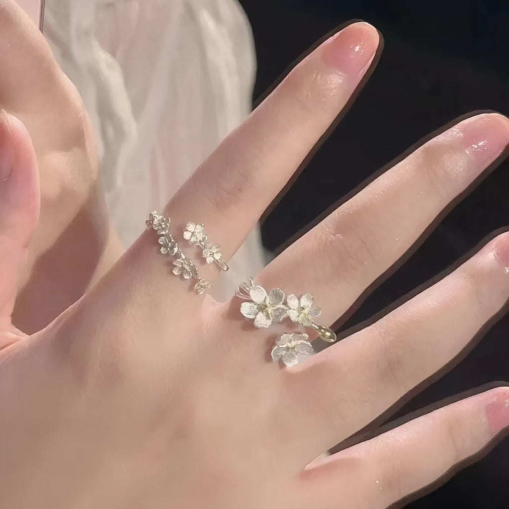 Three-dimensional jasmine flower ring with adjustable open-mouth design and electroplated finish