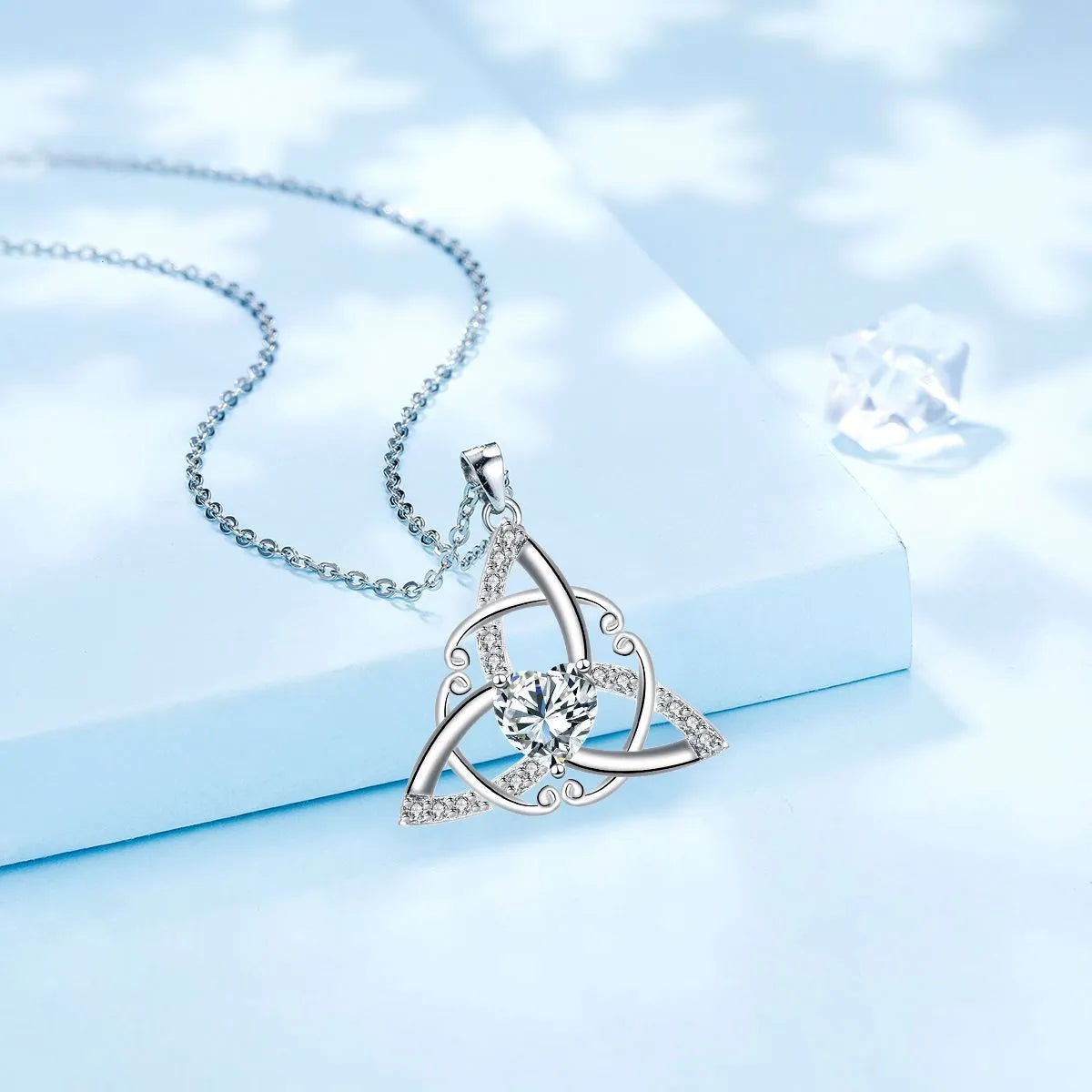 Geometric Celtic knot pendant necklace for women in solid copper with colour finish options.