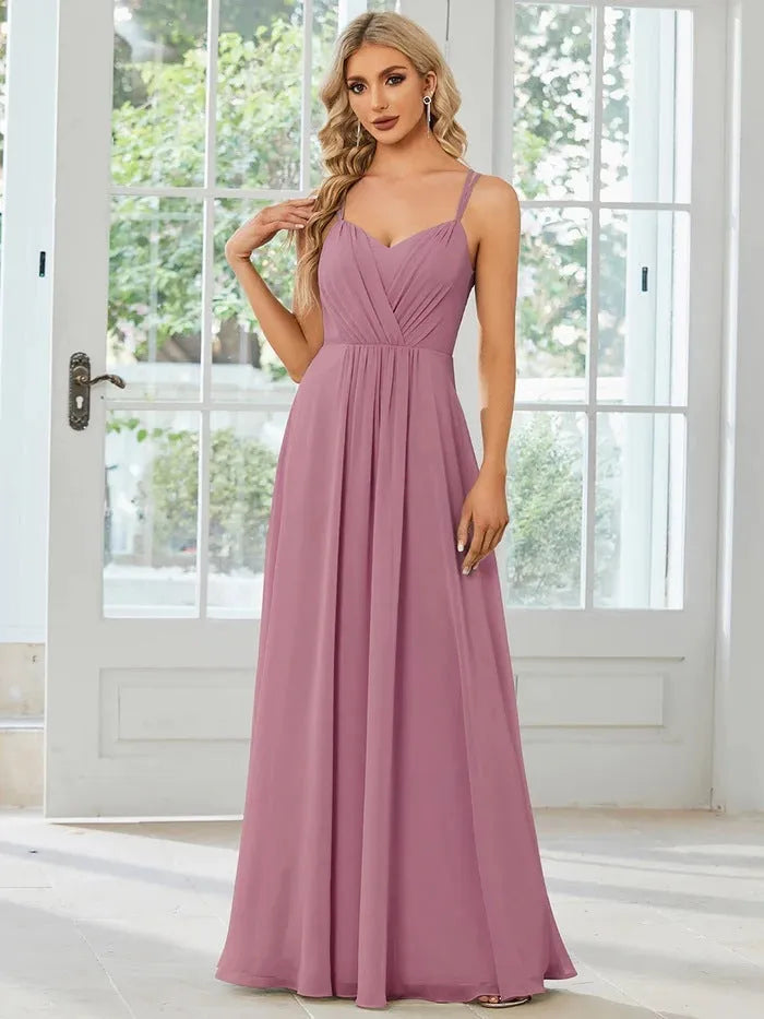Women's sleeveless long A-line pleated dress in solid colour polyester fabric