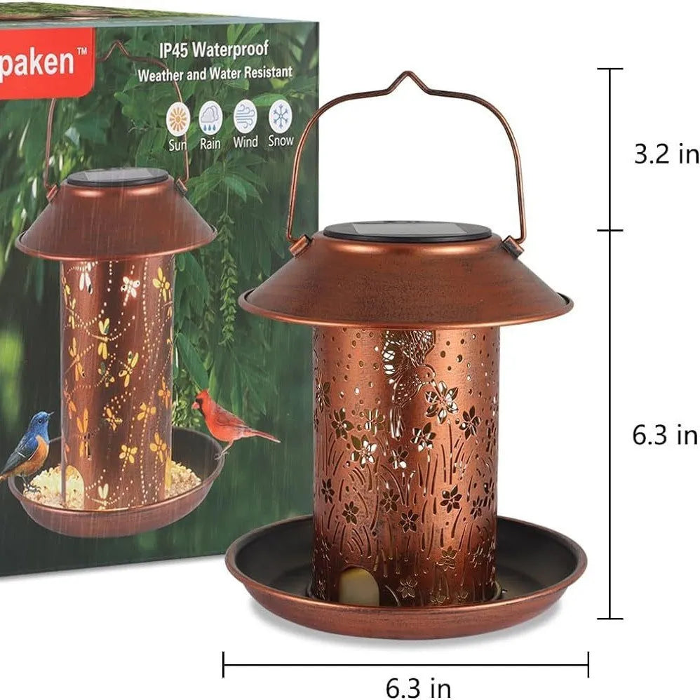 Solar-powered hummingbird-shaped bird feeder with integrated LED lighting for outdoor garden use