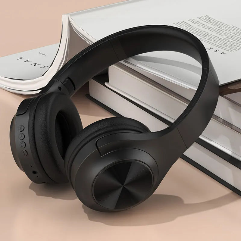 Creative design wireless Bluetooth headset in ivory white, shown in a head-mounted wearing style.