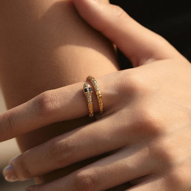 Adjustable copper snake ring with 18K gold plating on index finger