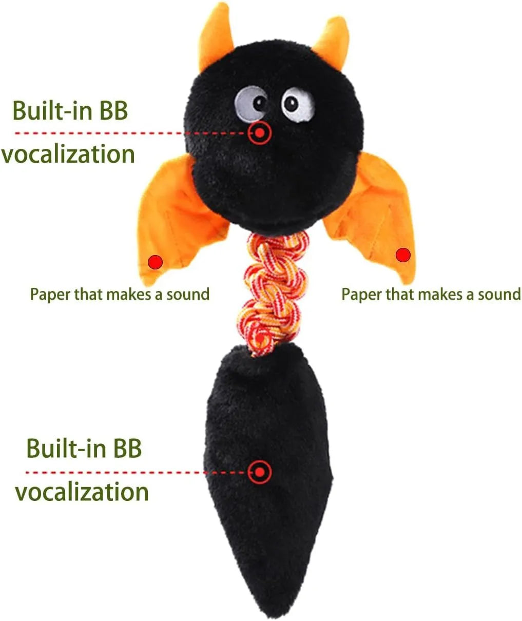 Large black plush dog toy with cartoon design, a rope knot, and a squeaker for chew play.