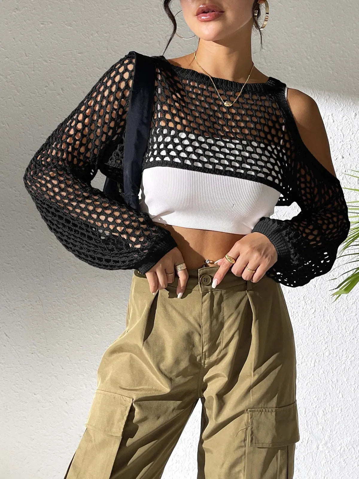 Mesh shirt with a navel cutout design in a free size, shown in one of six available colours.