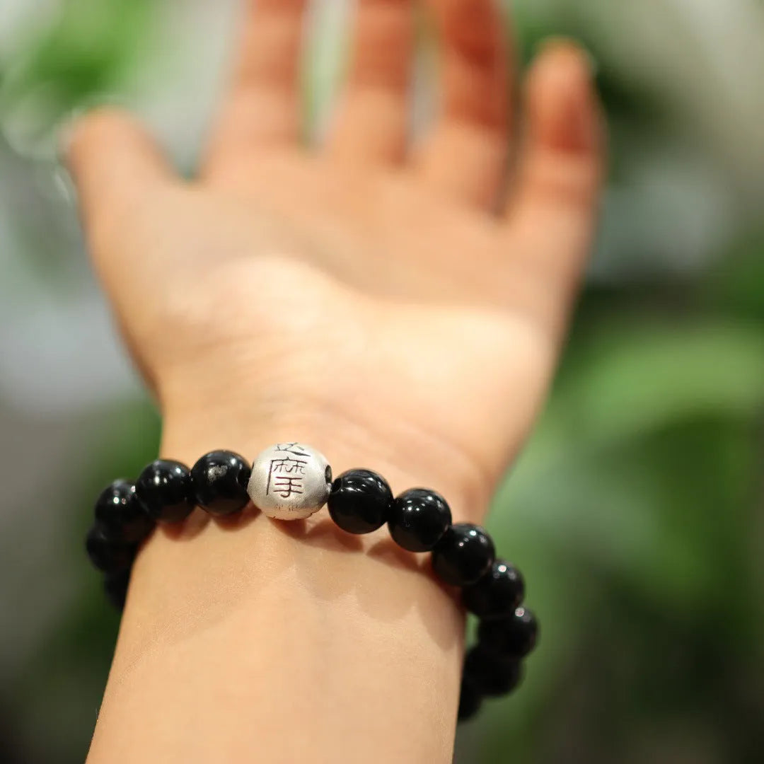 10mm black agate bracelet with sterling silver detailing in Chinese ethnic design style