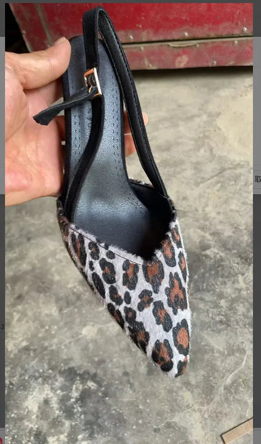 Women's leopard print suede sandals with pointed toe and high heel design on white background
