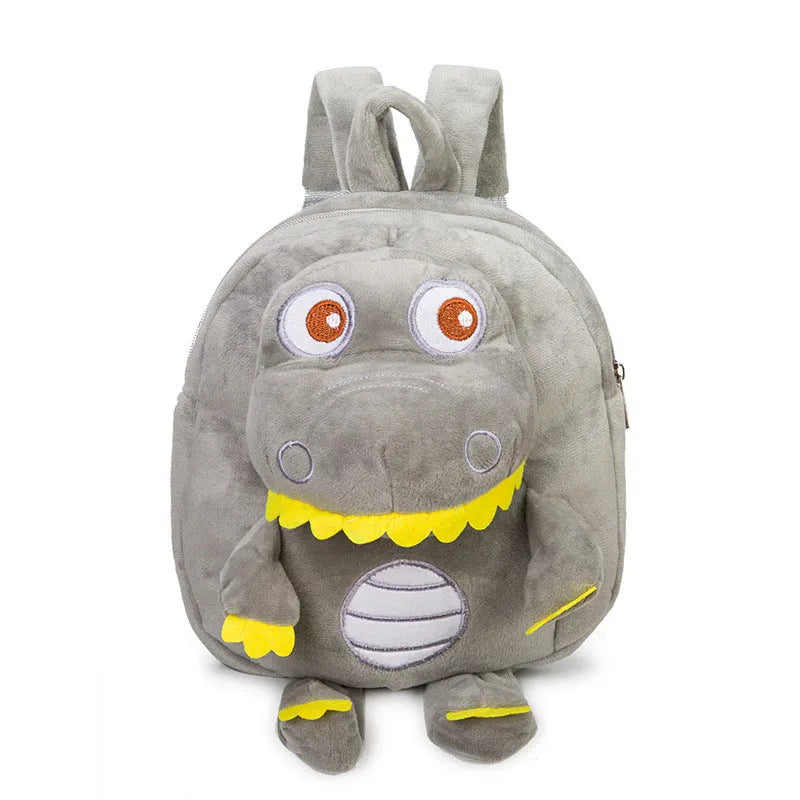 Blue soft plush dinosaur backpack for children with embroidered details and a soft carry handle.