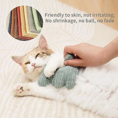Cyan and light coffee coloured plush catnip toy with a bell, shown next to a measuring tape indicating 12cm length.