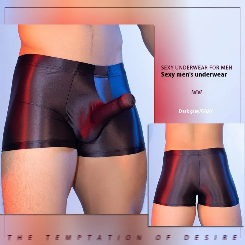 Seamless men's boxers in red nylon fabric with mid waist and elephant nose pouch design.