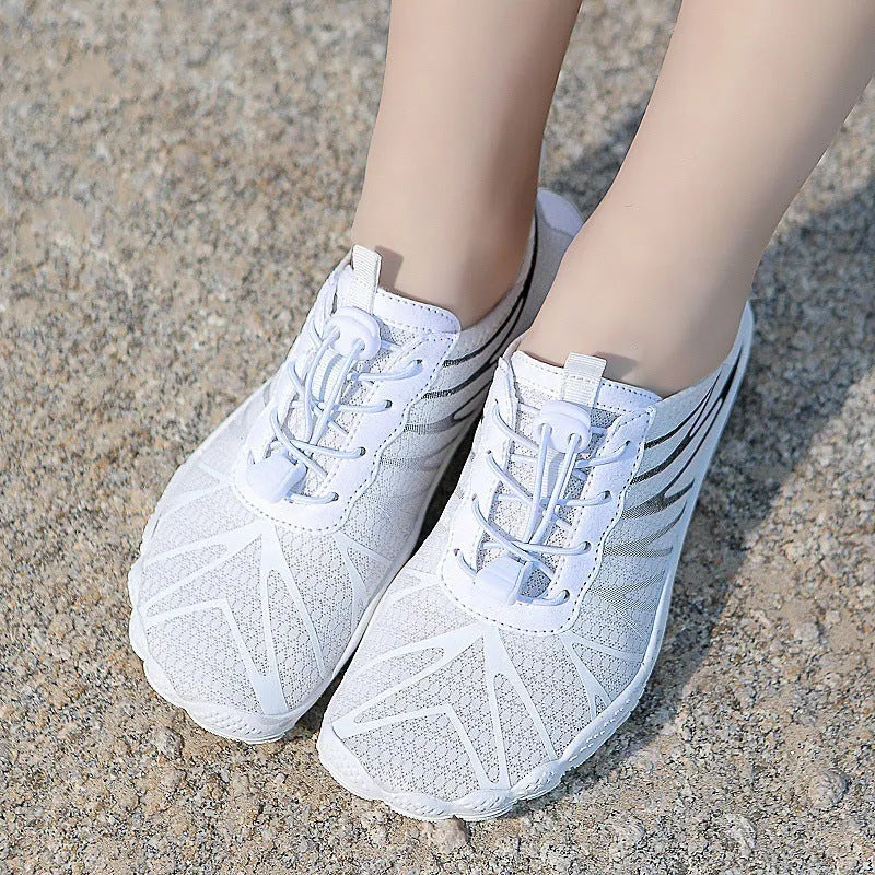 Low-top casual sports running shoe in colour option, showing front lace-up and textured natural rubber outsole.
