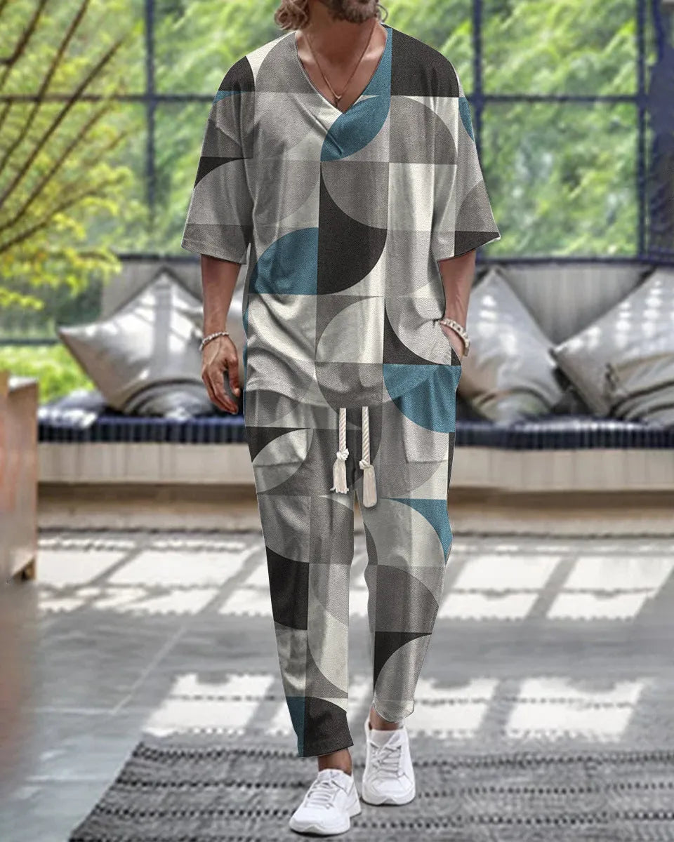 Women's light grey V-neck cropped sleeve trouser suit two-piece set on a hanger.