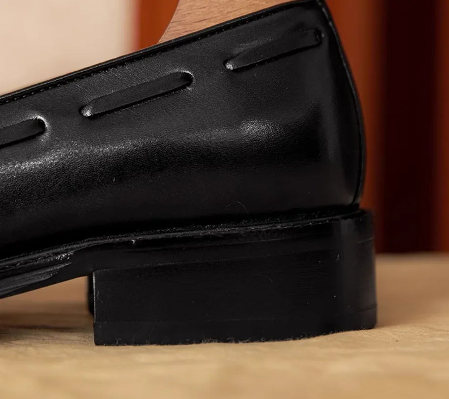 Men's black genuine leather slip-on loafers with fringed design and rubber sole