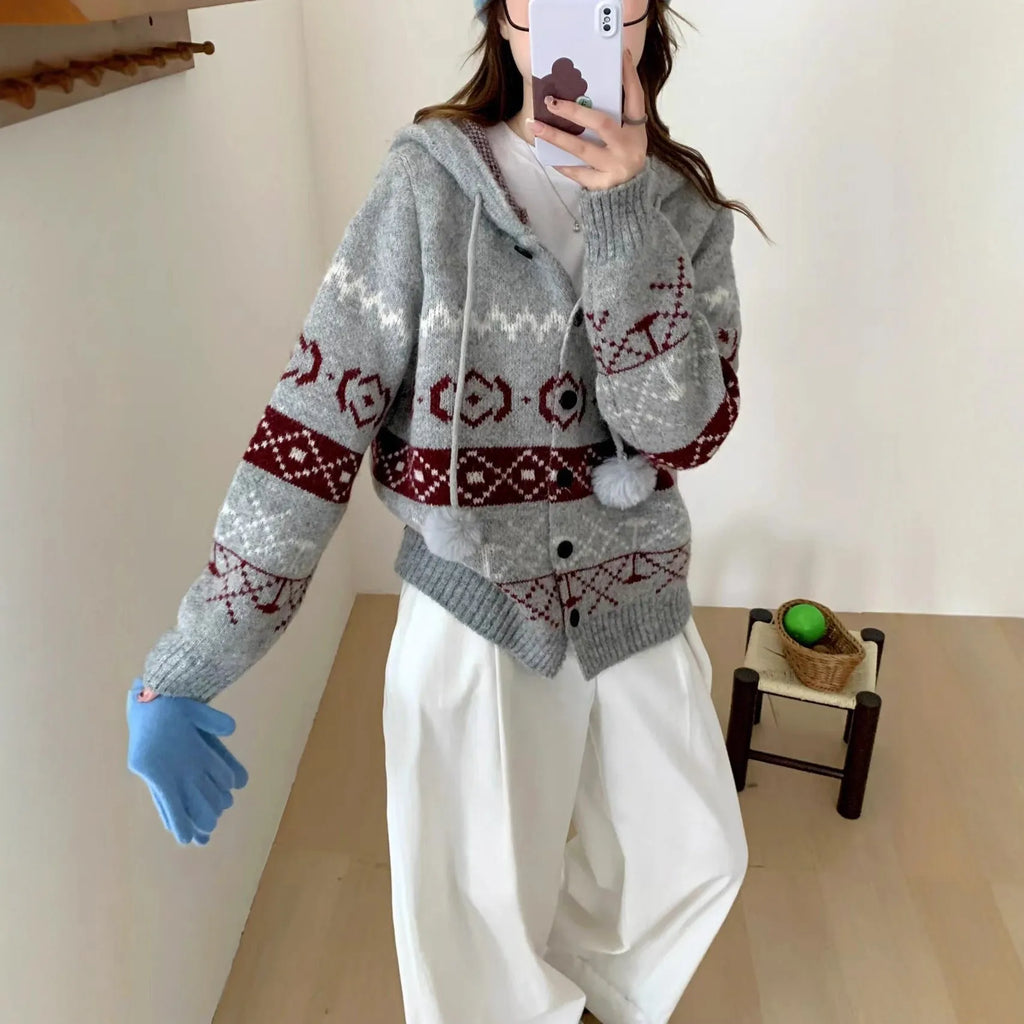 Geometric pattern brocade sweater coat in milky white colour with loose fit free size design