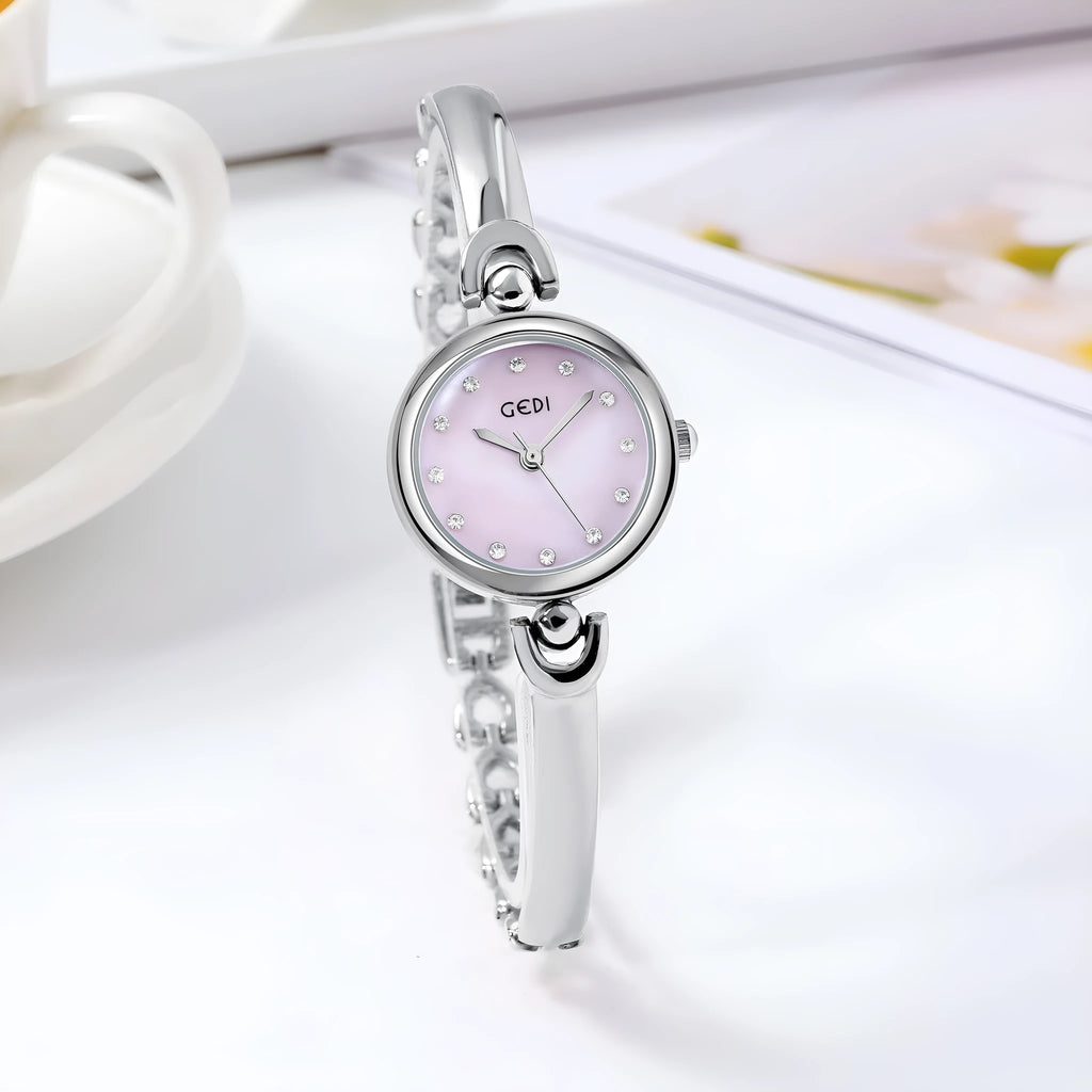 Silver case women's bangle watch with round dial and white plate silver stripe