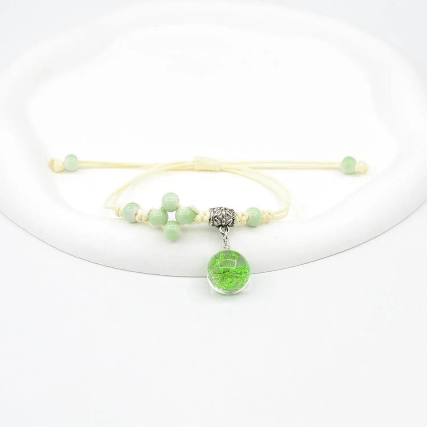 Glass dried flower bracelet with large 1.4cm beads containing real preserved flowers in hand-woven design