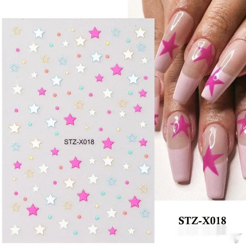 Sheet of black and silver love heart pattern nail art stickers with a plastic nail patch.