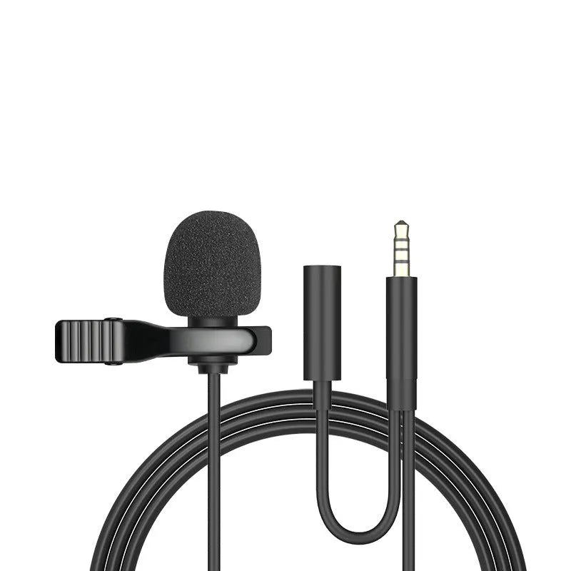 White lavalier lapel clip microphone with long cable and in-ear earpieces next to an iPhone.