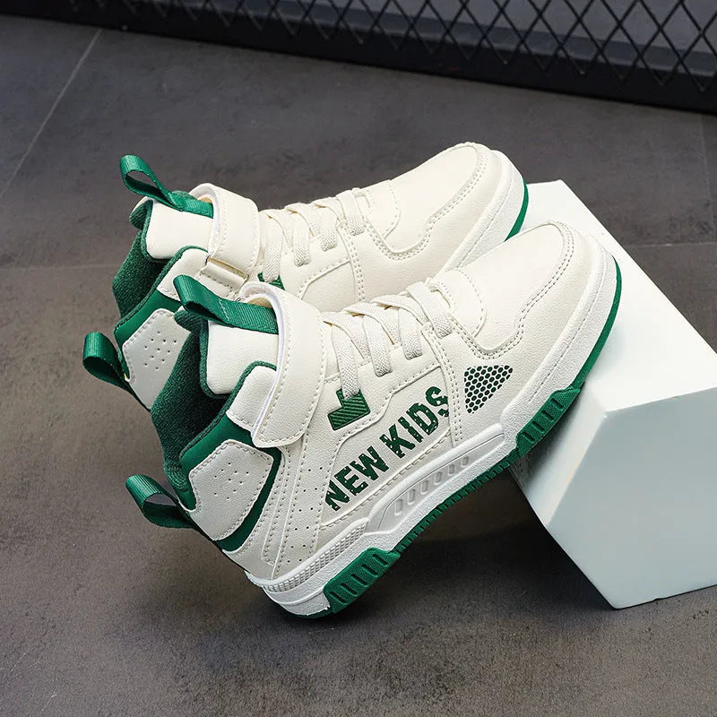 Children's beige green street sneakers with a buckle closure, shown on a white background.