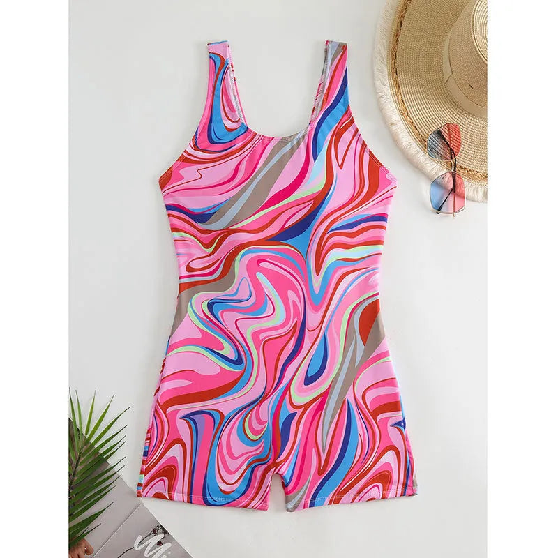 Women's printed polyester one-piece swimsuit with a high waist and backless design in a tight fit.