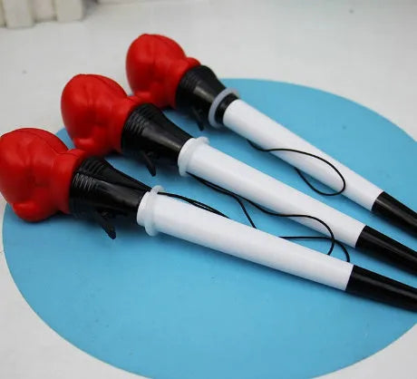 Four Creative Pressure Relief Boxing Press Ejection Pens with plug-in sleeves and black ink refills.