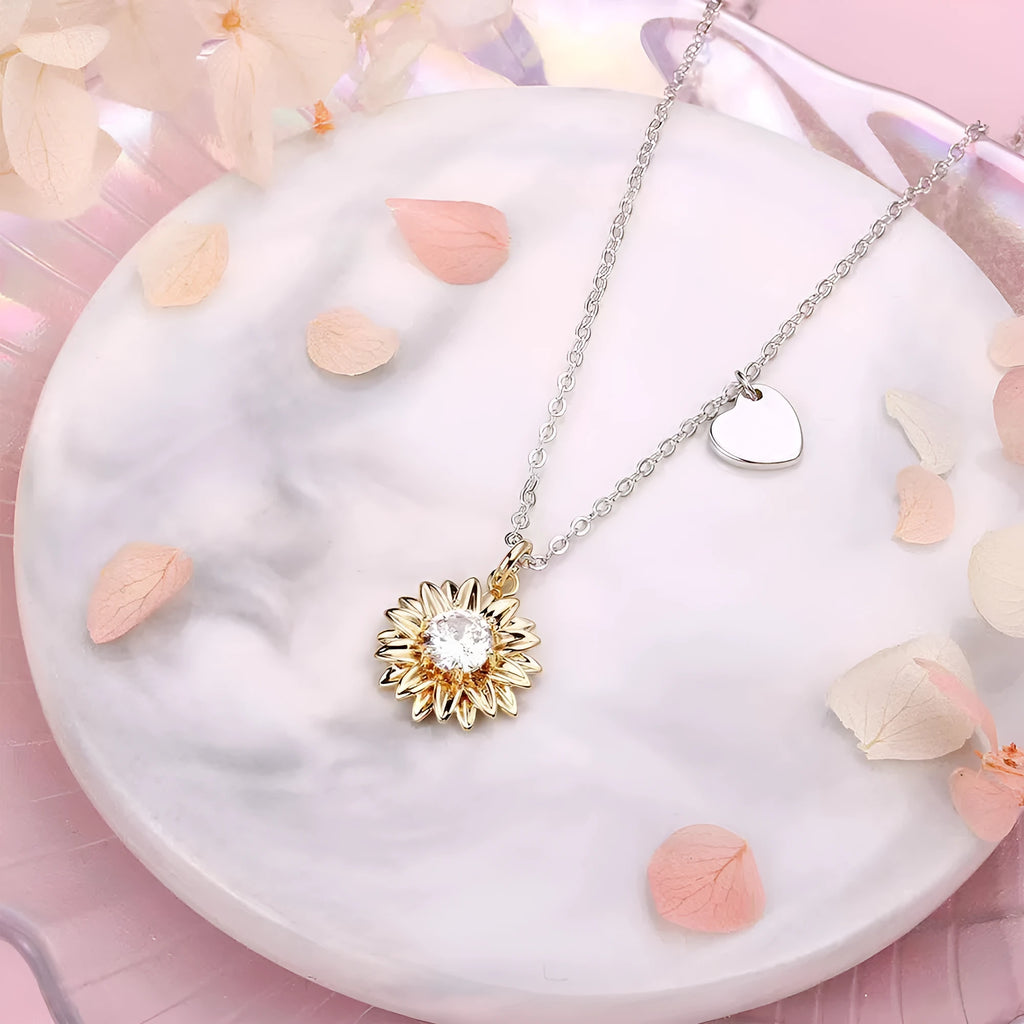 925 sterling silver sunflower necklace with daisy petal detail on an adjustable cross chain