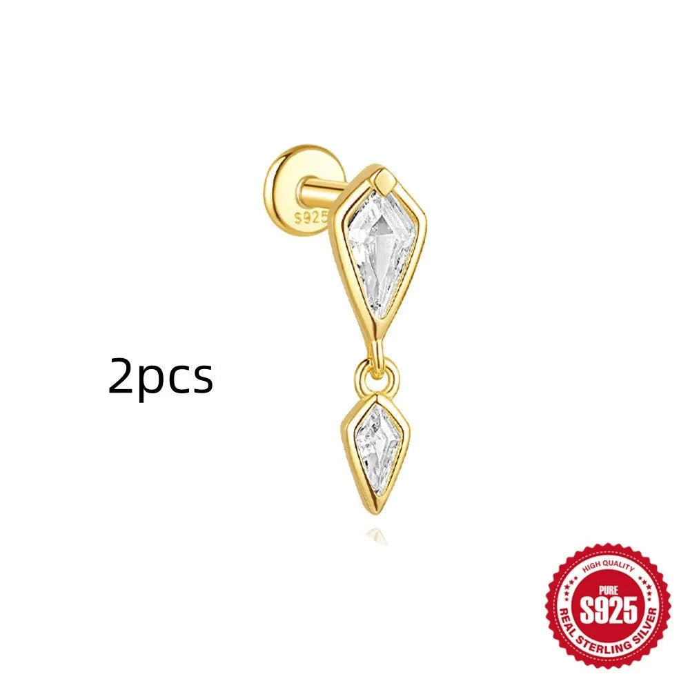 Geometric kite-shaped sterling silver earrings with a gold electroplated chain tassel featuring rhinestones.