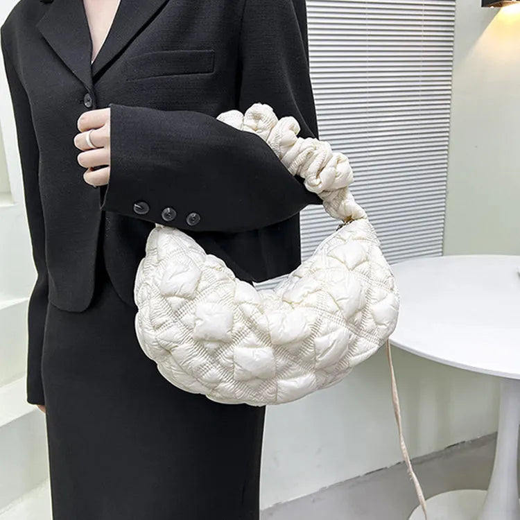 Women's nylon shoulder messenger bag in beige colour showing adjustable strap and dimensions