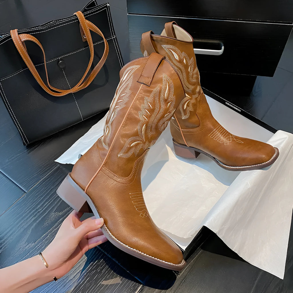 Brown women's mid-calf lace-up Martin boots with embroidery detail on the shaft