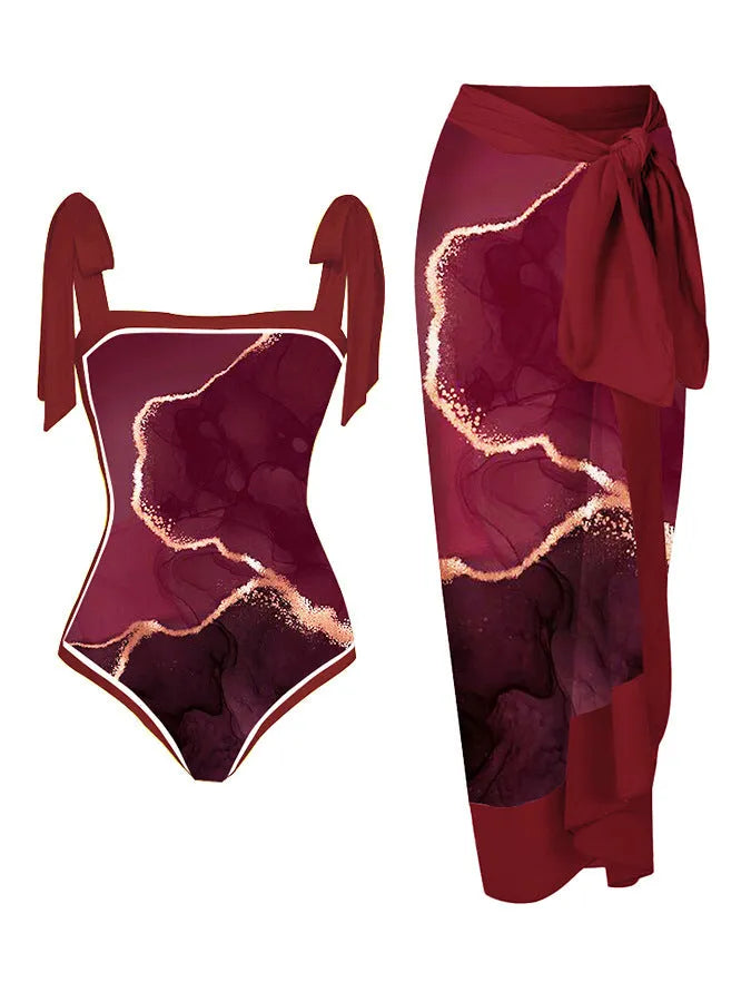 Women's printed floral two-piece swimsuit with a matching chiffon hip skirt.