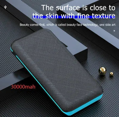 Black wireless solar power bank with Qi charging pad, three USB ports and an LED flashlight