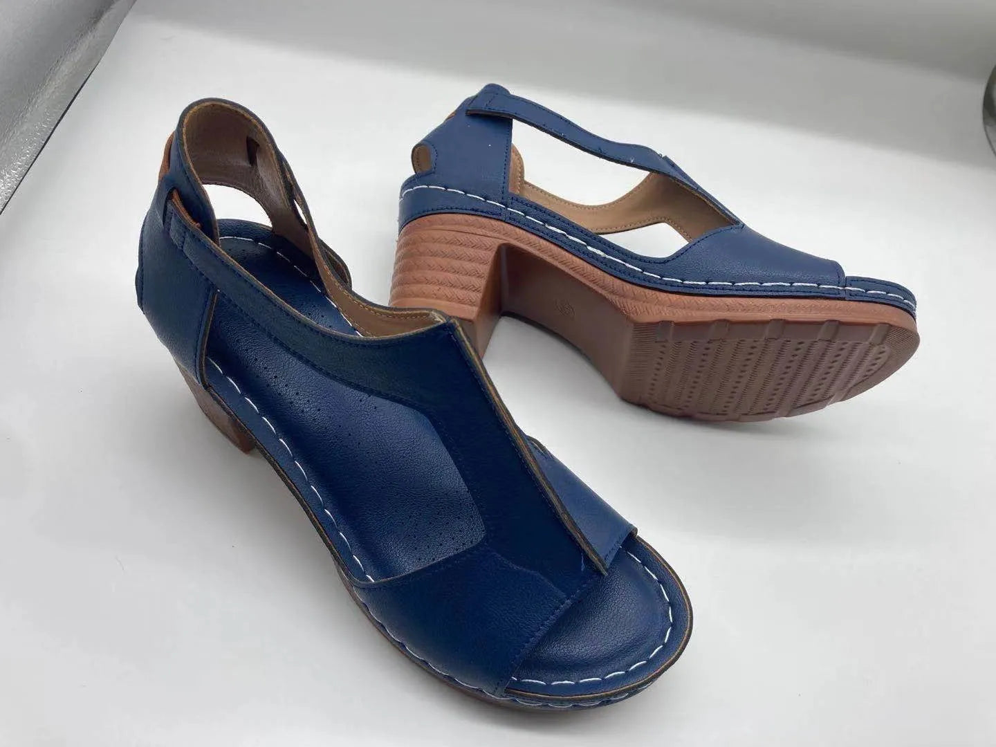 Plus size women's wedge sandals with peep toe, Roman buckle detail, and fish mouth design