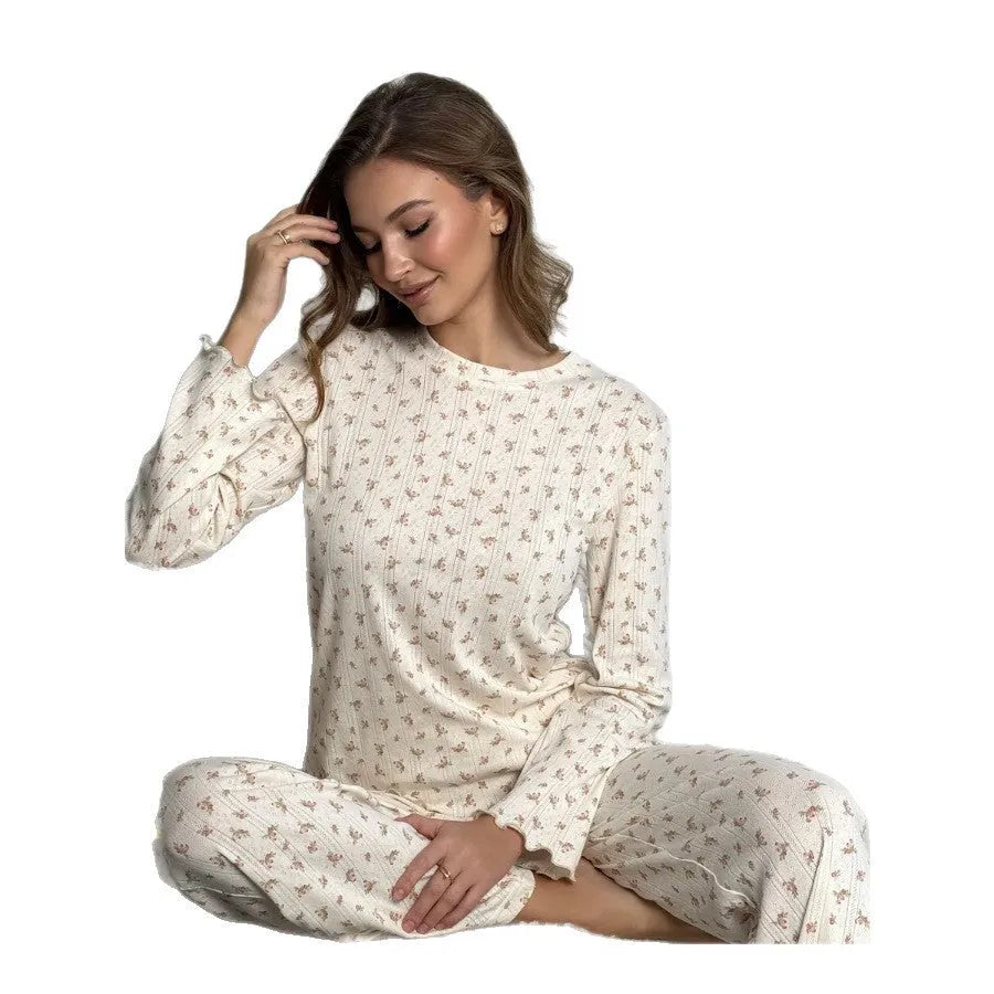 Women's white floral print lounge suit with bell sleeve top and wide leg trousers